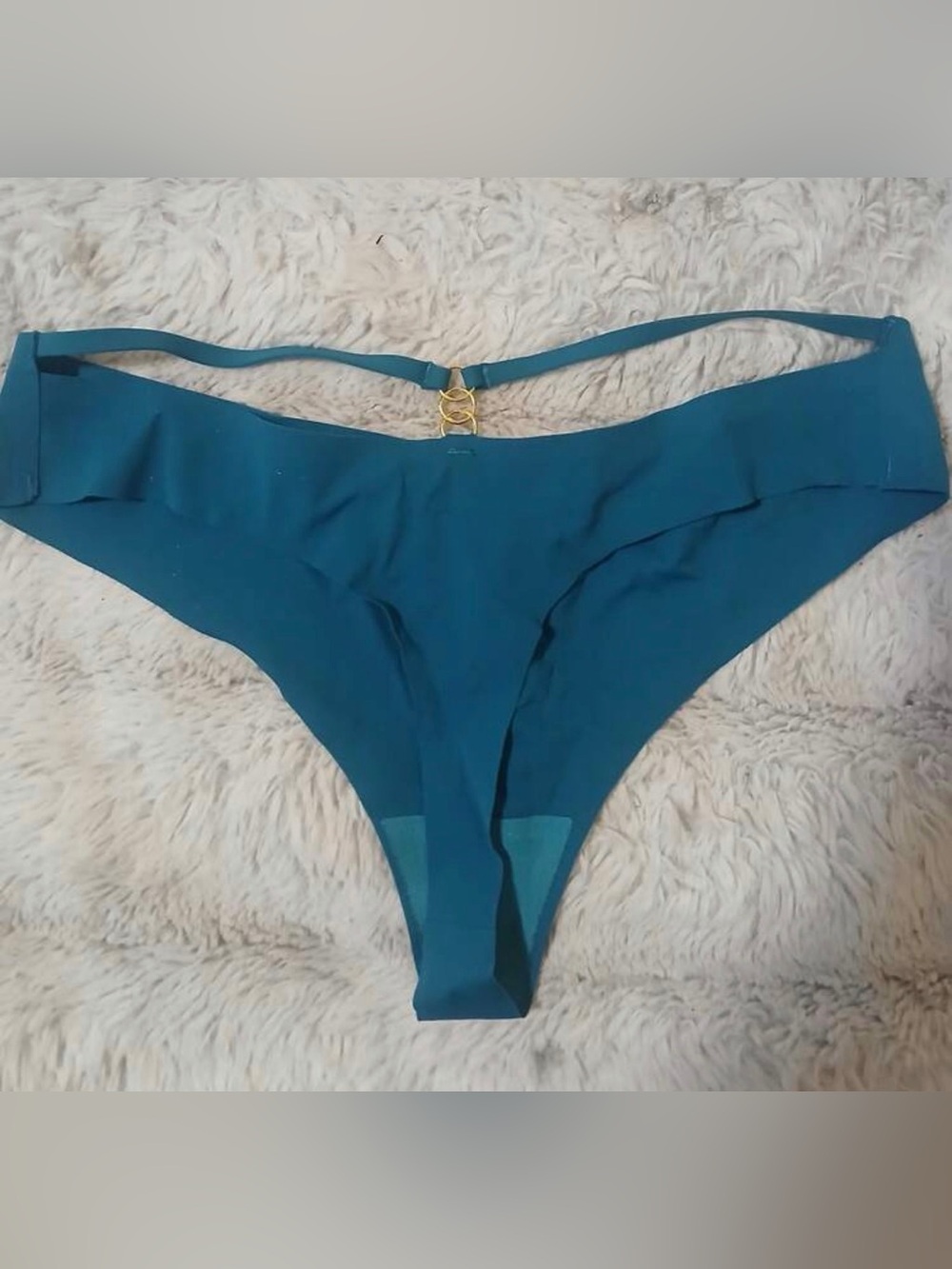 Sexy metal garment teal thong, size M